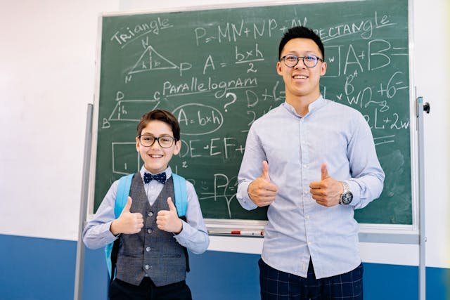 Tutor helping a student during a personalised maths lesson