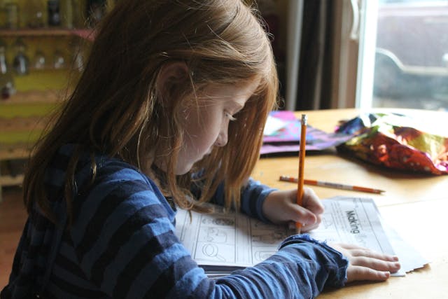 Child practicing Math at Aussie Math Tutor NSW